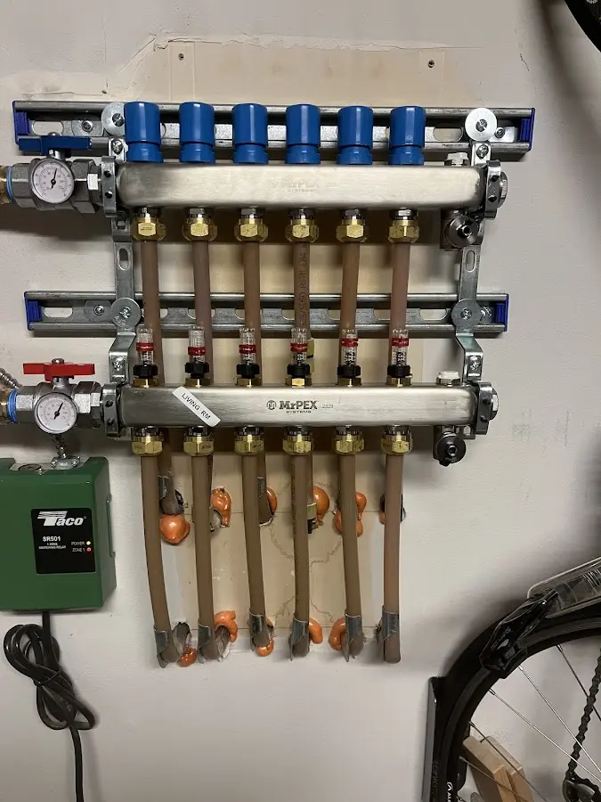 Plumber performing Gas Line Installation at a residential property in Webster